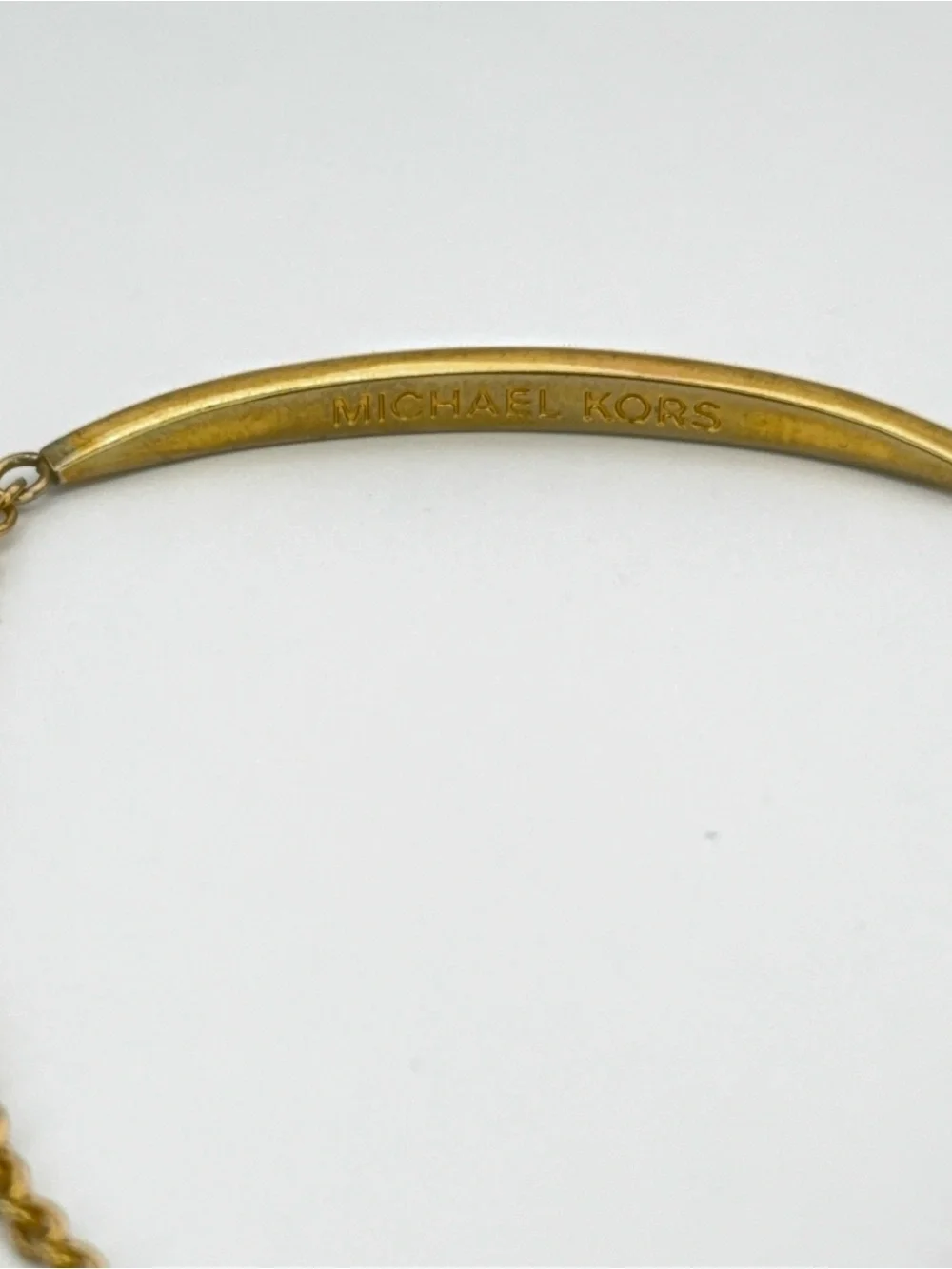 Gold-tone MK Michael Kors pavé curved bar Bracelet